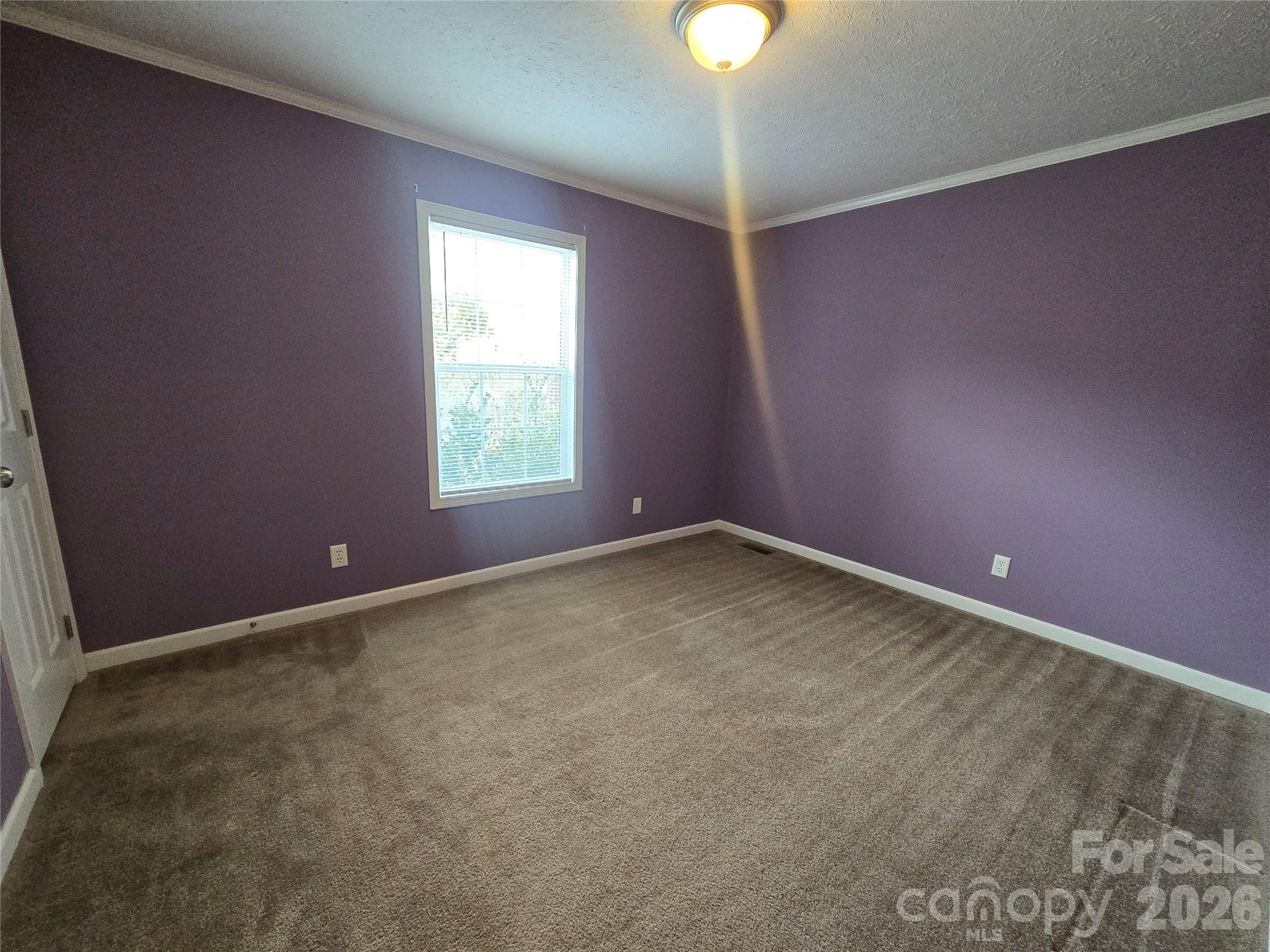 703 Garren Creek Road Fairview, NC 28730 - Photo 30 of 48 an empty room with a window
