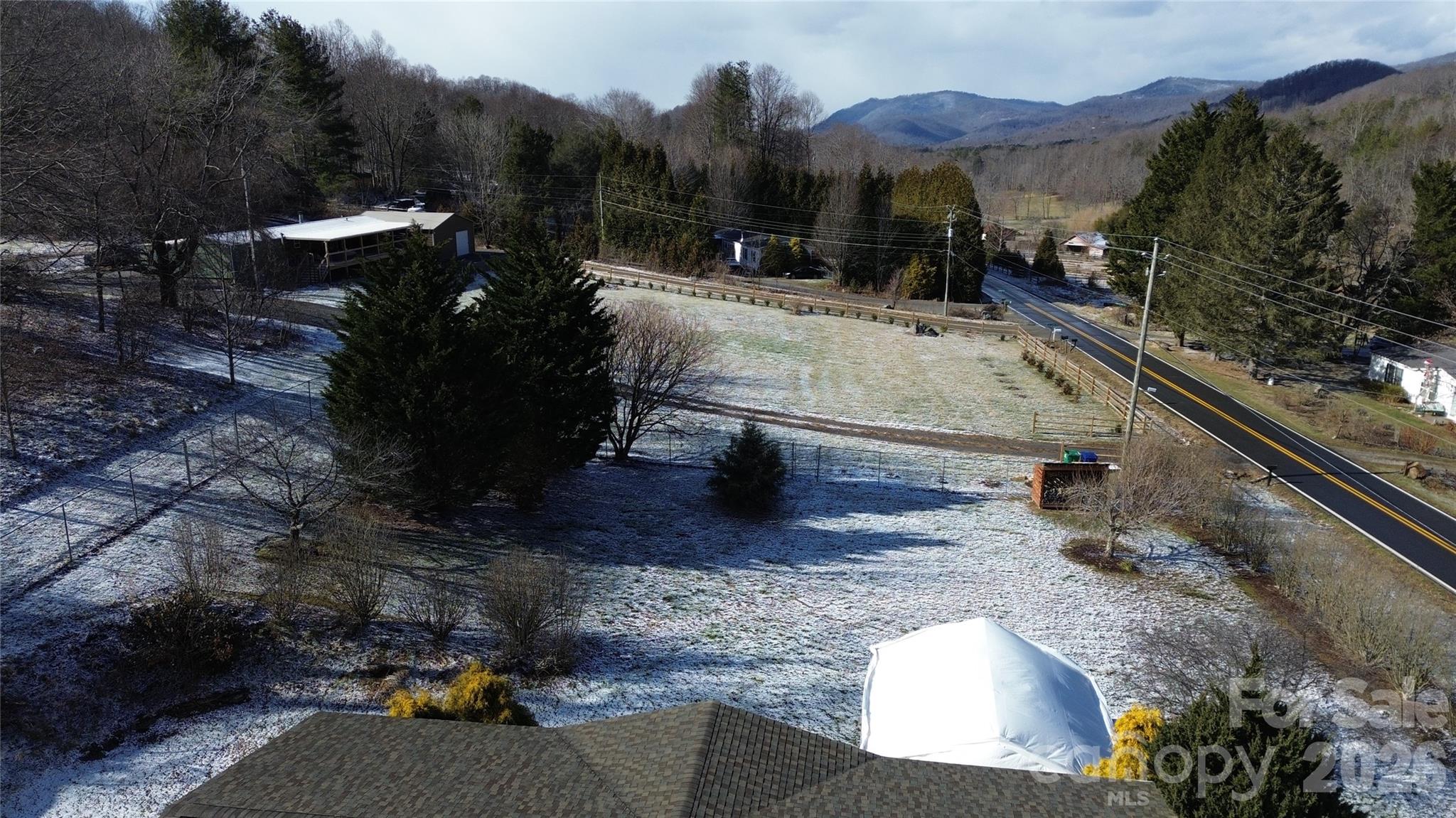 703 Garren Creek Road Fairview, NC 28730 - Photo 3 of 48 a view of a terrace with a yard