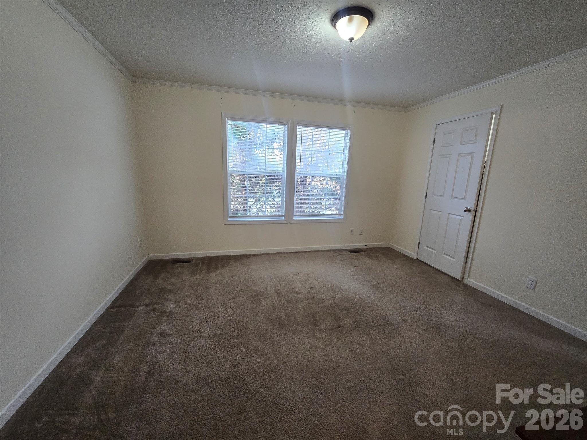 703 Garren Creek Road Fairview, NC 28730 - Photo 35 of 48 an empty room with windows