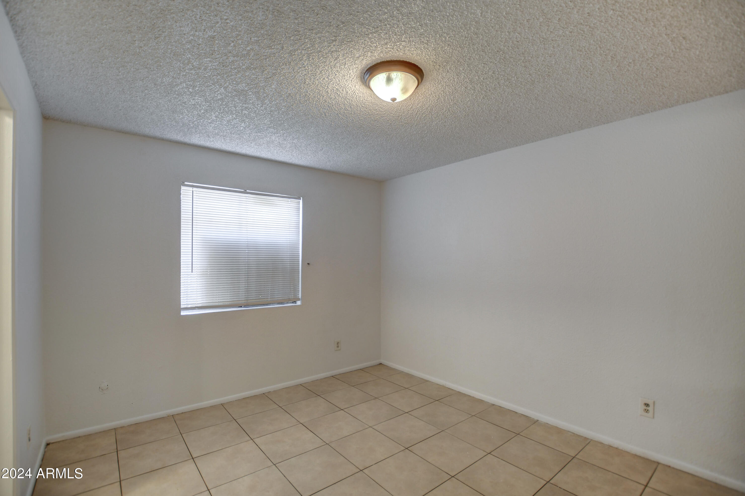 6711 West Osborn Road, Unit 19 Phoenix, AZ 85033 - Photo 16 of 24 Primary Bed 1