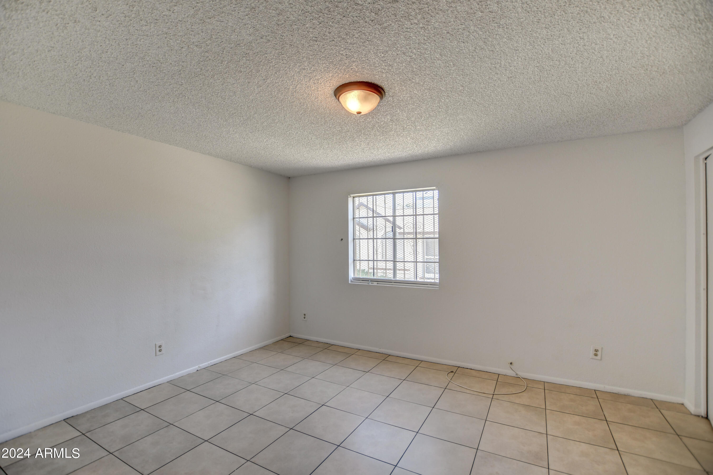 6711 West Osborn Road, Unit 19 Phoenix, AZ 85033 - Photo 18 of 24 Bed 2, 1jpg