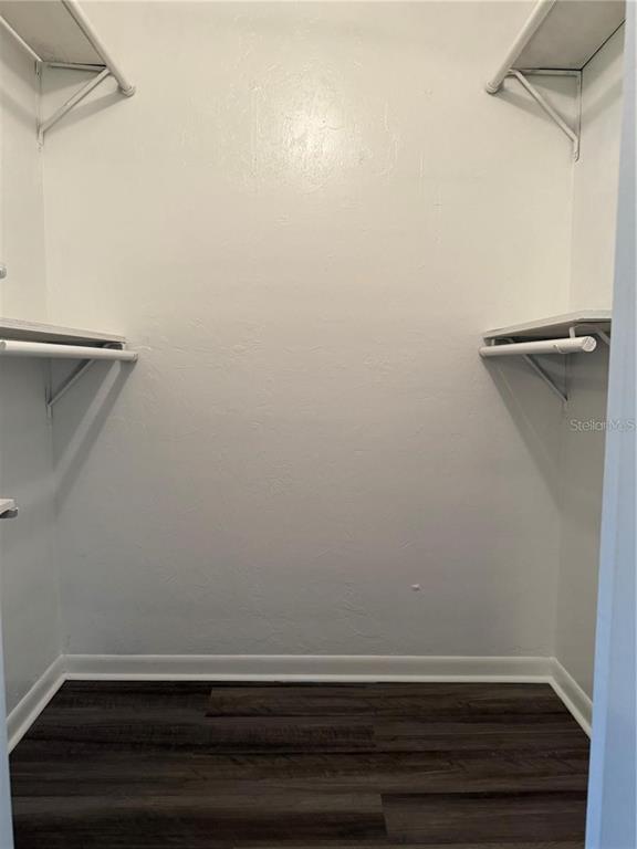 4313 Southwest 68th Terrace Gainesville, FL 32608 - Photo 11 of 14 a room with a bench and cabinets