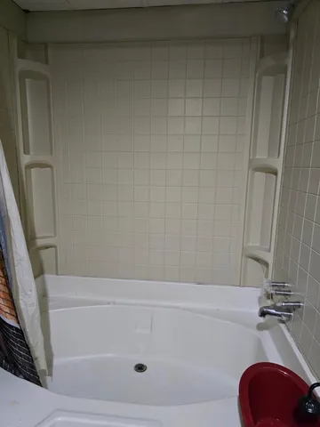 a bathroom with a bathtub