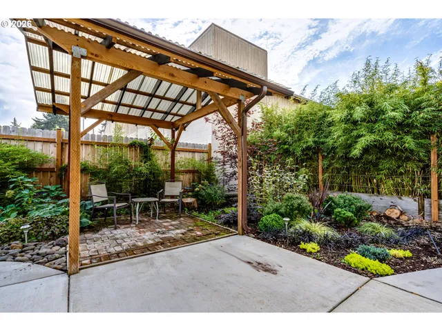 a garden view with a seating space