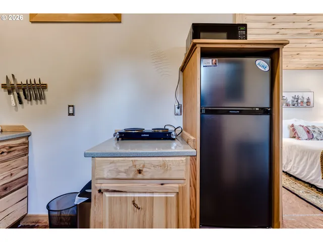 a utility room with closet dryer and washer