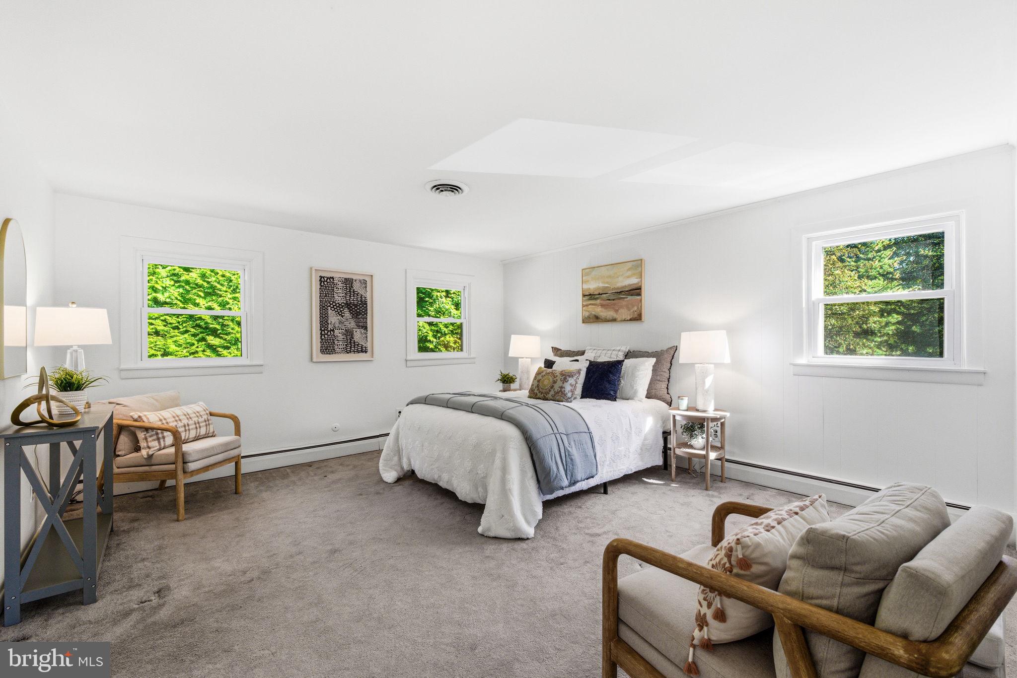 210 Cooper Drive Wallingford, PA 19086 - Photo 21 of 47 a bed room with two beds and a chair