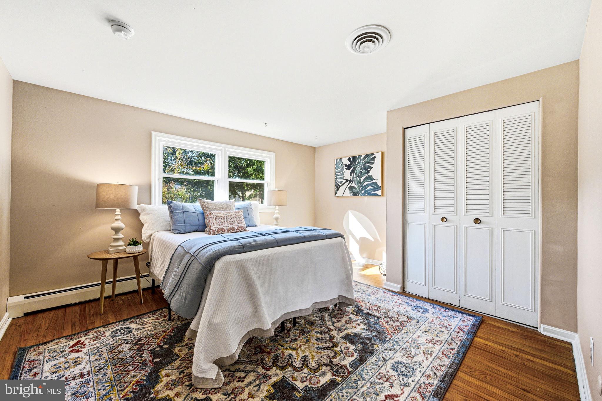 210 Cooper Drive Wallingford, PA 19086 - Photo 25 of 47 a bed room with a bed and a window