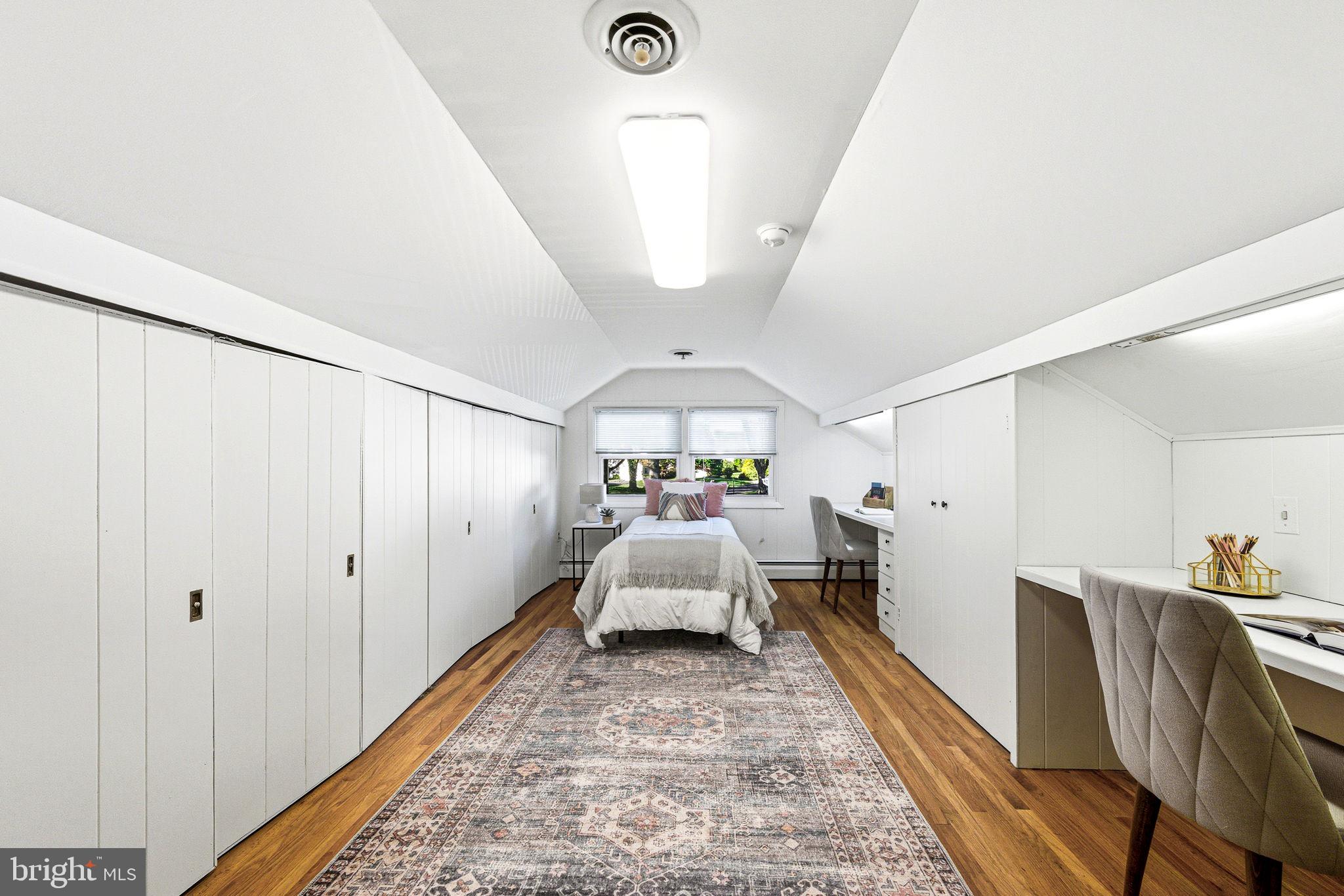 210 Cooper Drive Wallingford, PA 19086 - Photo 26 of 47 a bedroom with furniture and white walls