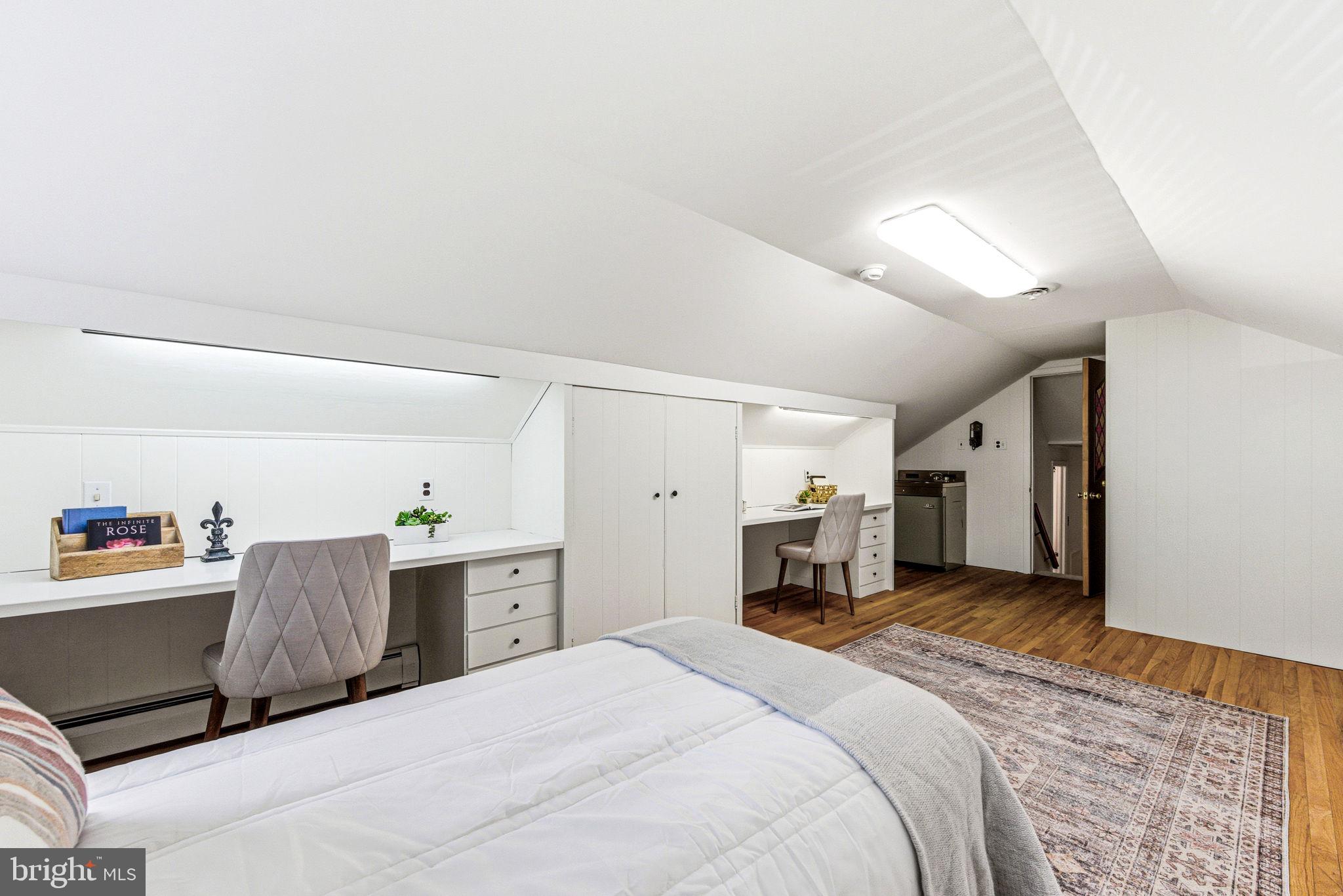 210 Cooper Drive Wallingford, PA 19086 - Photo 27 of 47 a bedroom with a large bed and dresser