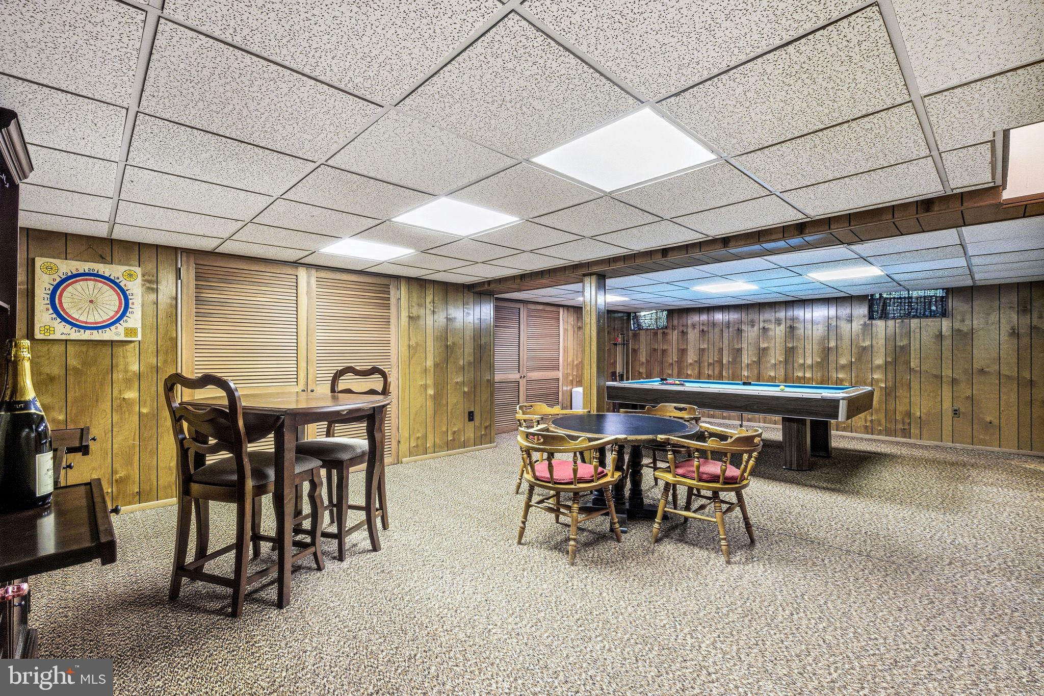 210 Cooper Drive Wallingford, PA 19086 - Photo 31 of 47 a view of a dining room with furniture window and outside view
