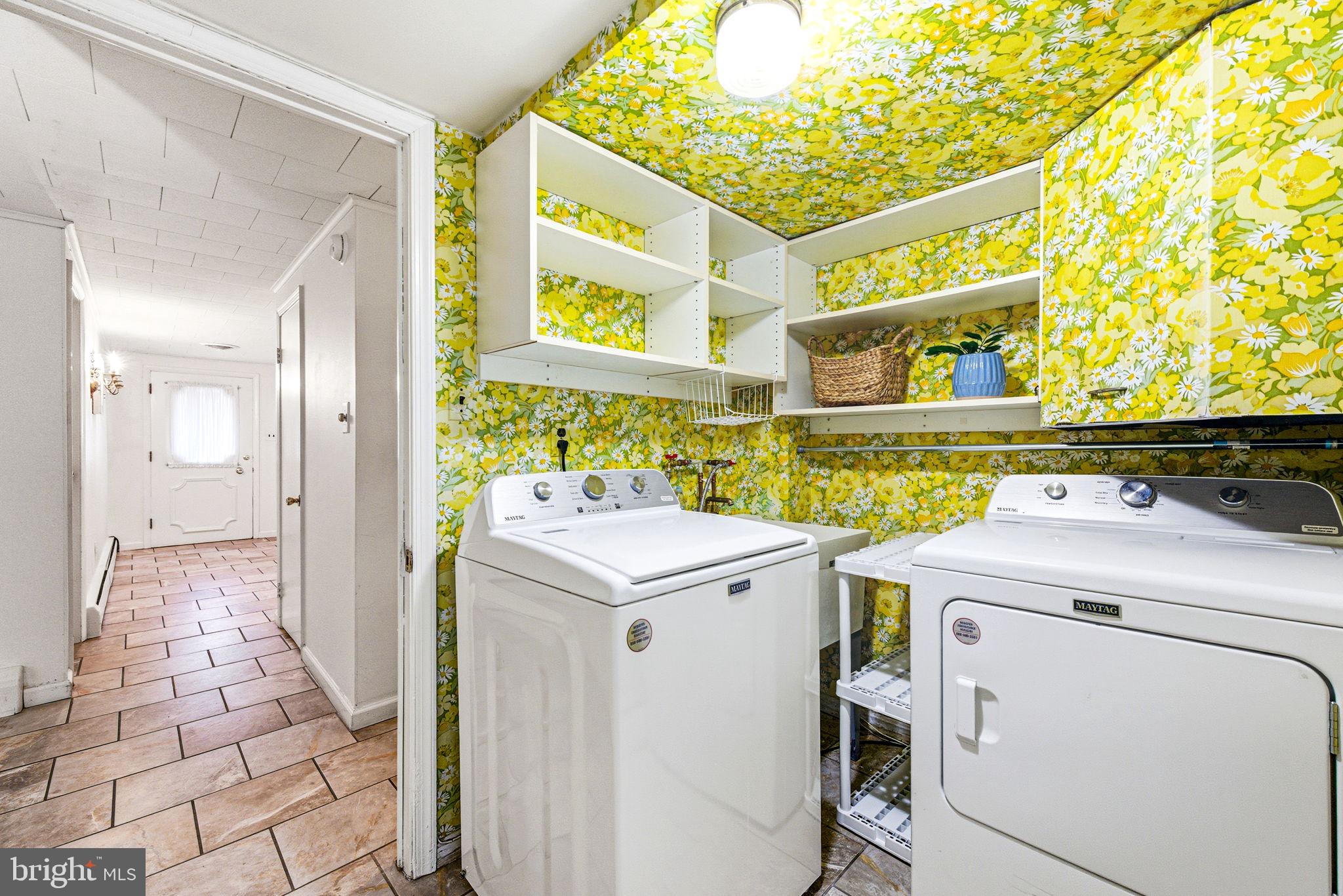 210 Cooper Drive Wallingford, PA 19086 - Photo 33 of 47 a utility room with dryer and washer