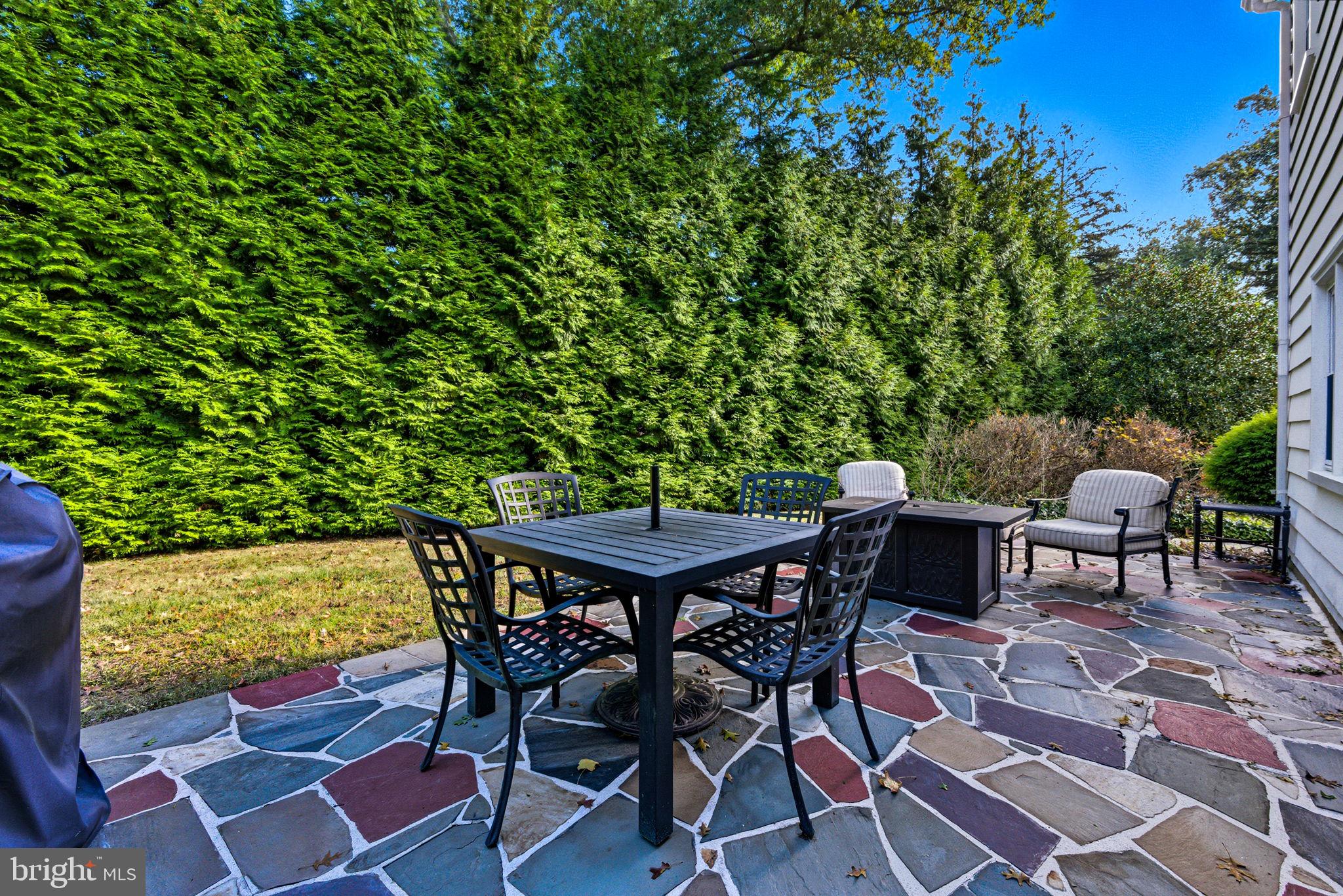 210 Cooper Drive Wallingford, PA 19086 - Photo 34 of 47 a view of a chairs and table in the patio