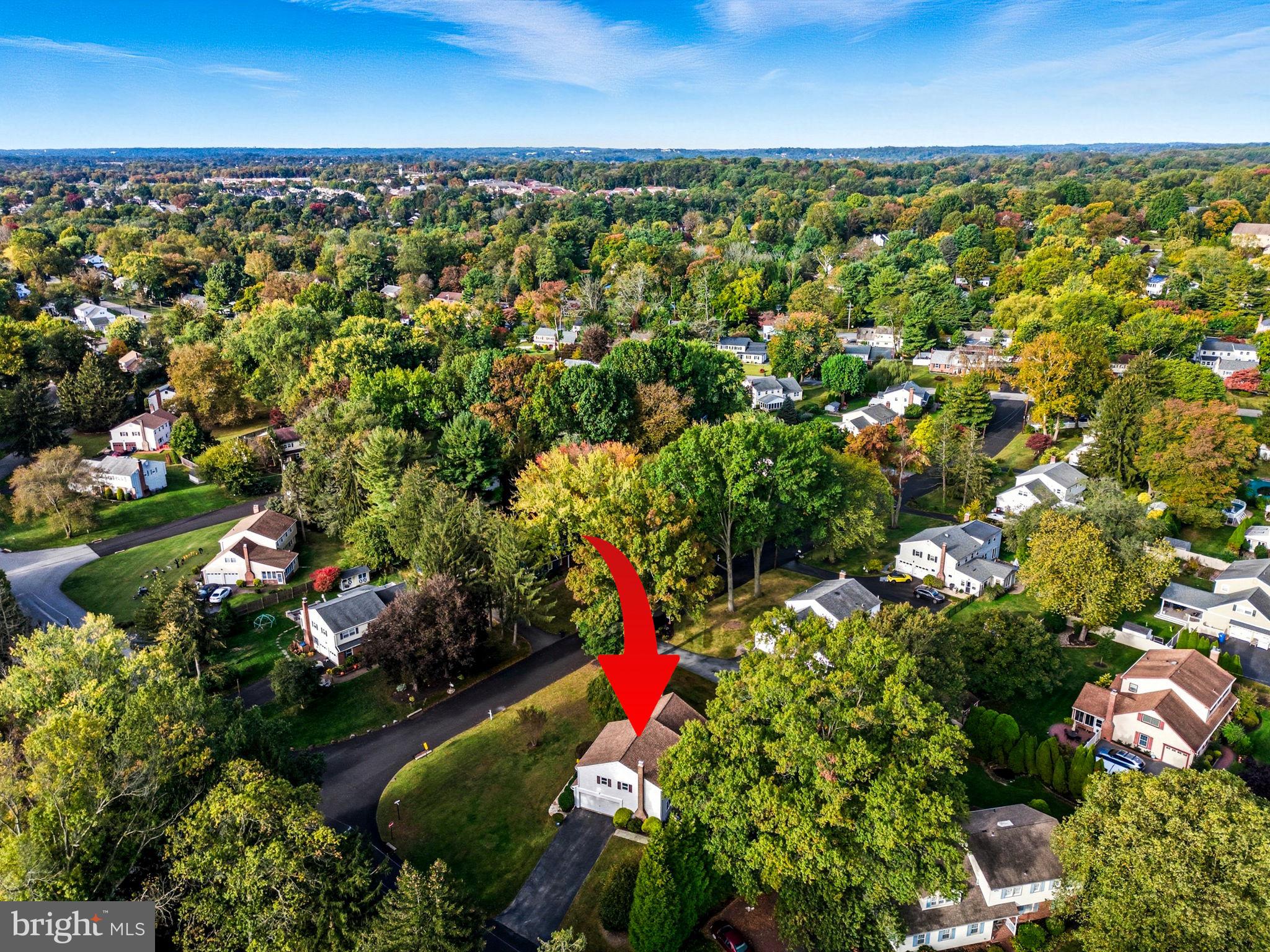 210 Cooper Drive Wallingford, PA 19086 - Photo 40 of 47 an aerial view of residential houses with outdoor space and swimming pool