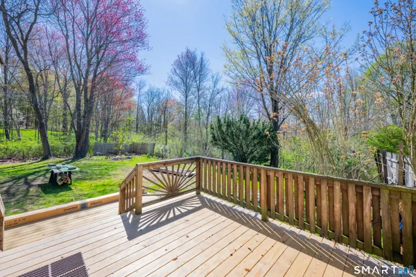 a view of deck with a yard