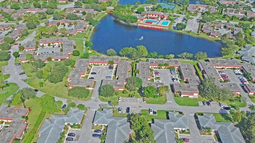 784 Nantucket Circle, Unit A Lake Worth, FL 33467 - Photo 27 of 30 an aerial view of residential houses with outdoor space