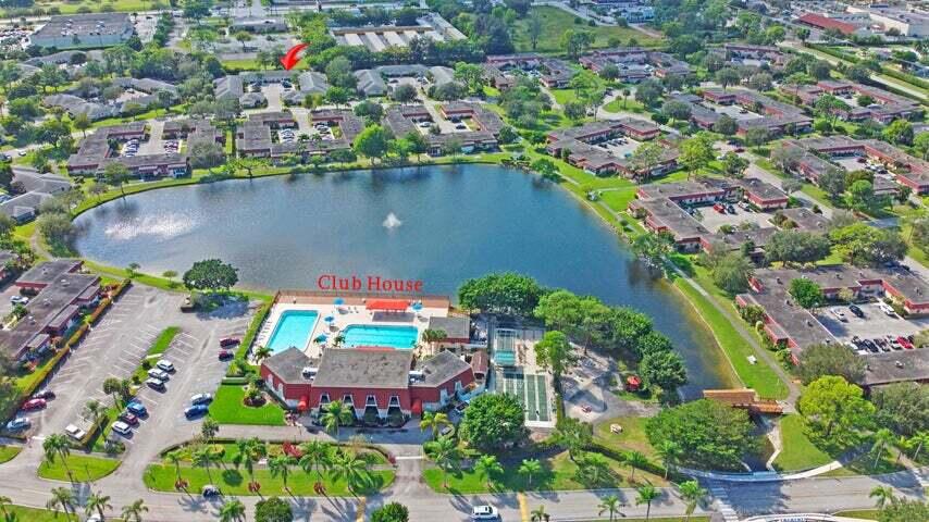 784 Nantucket Circle, Unit A Lake Worth, FL 33467 - Photo 29 of 30 an aerial view of residential houses with outdoor space and swimming pool