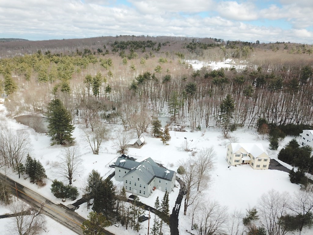 166 Littleton Road, Unit 1 Harvard, MA 01451 - Photo 19 of 23 a view of a lake with a mountain