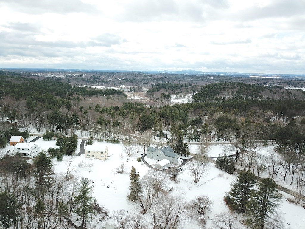 166 Littleton Road, Unit 1 Harvard, MA 01451 - Photo 20 of 23 a view of a lake view and covered with snow
