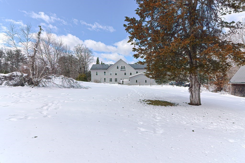 166 Littleton Road, Unit 1 Harvard, MA 01451 - Photo 23 of 23 a view of road and snow