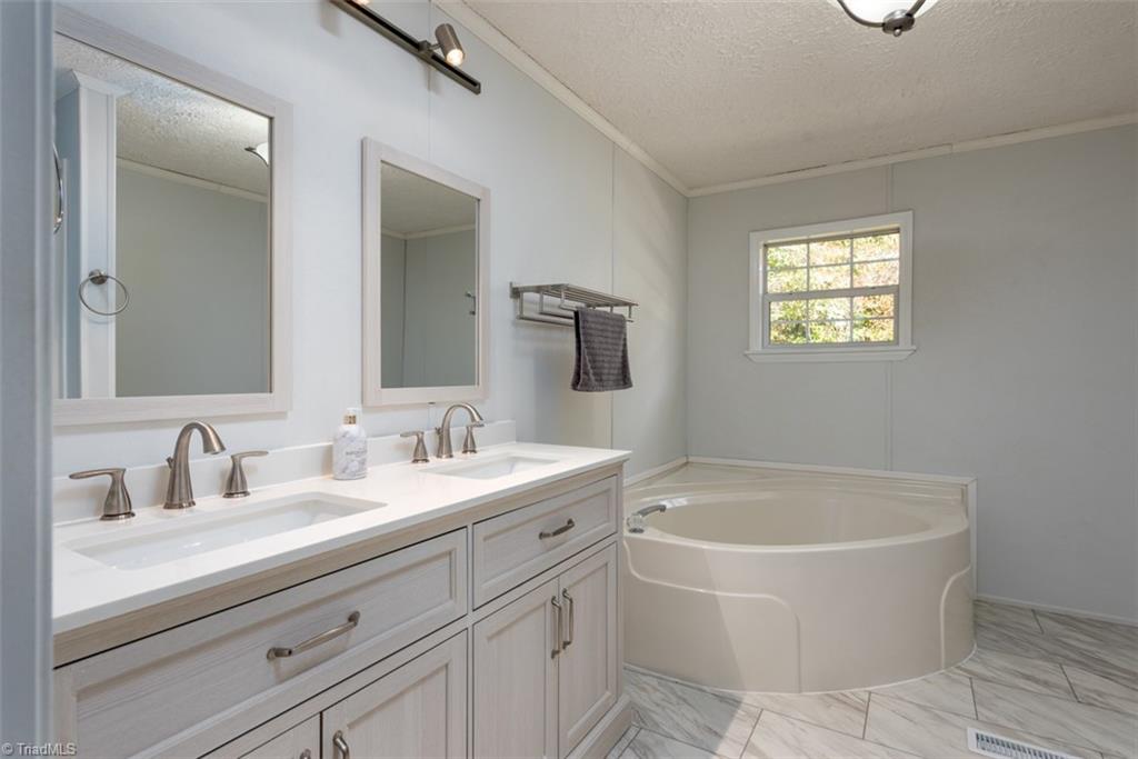 1126 Radhas Way Sandy Ridge, NC 27046 - Photo 11 of 22 primary bath double sink