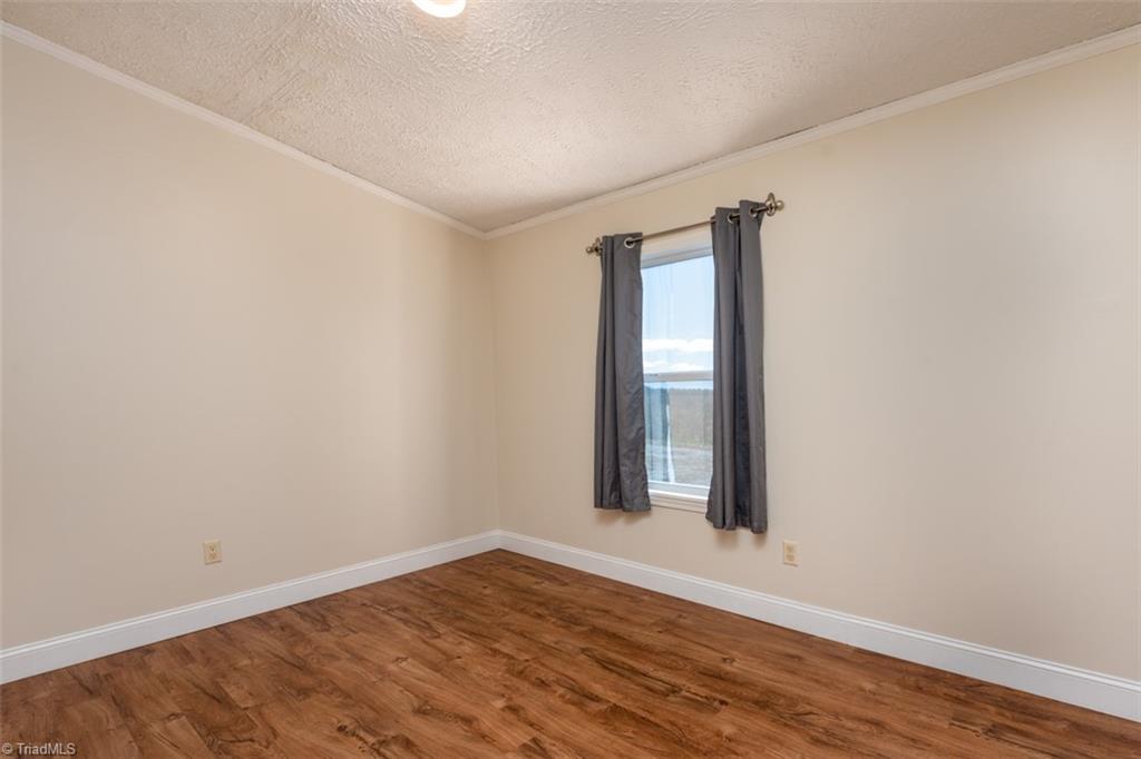 1126 Radhas Way Sandy Ridge, NC 27046 - Photo 16 of 22 3rd bedroom