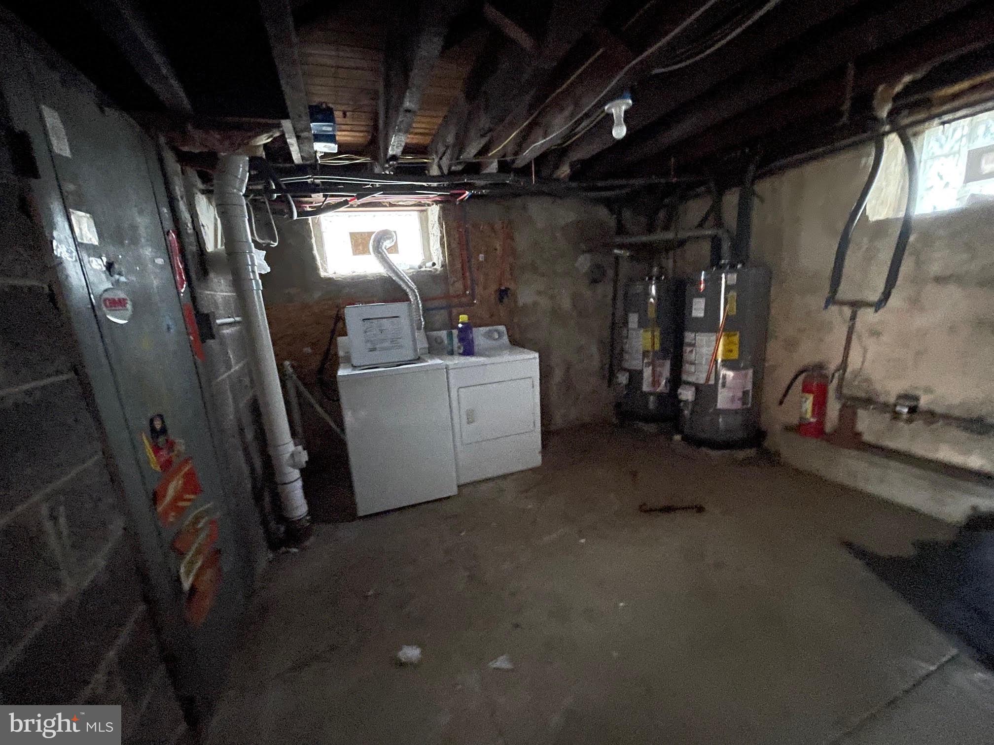 412 East Providence Road Aldan, PA 19018 - Photo 11 of 13 a view of a storage room with washer and dryer