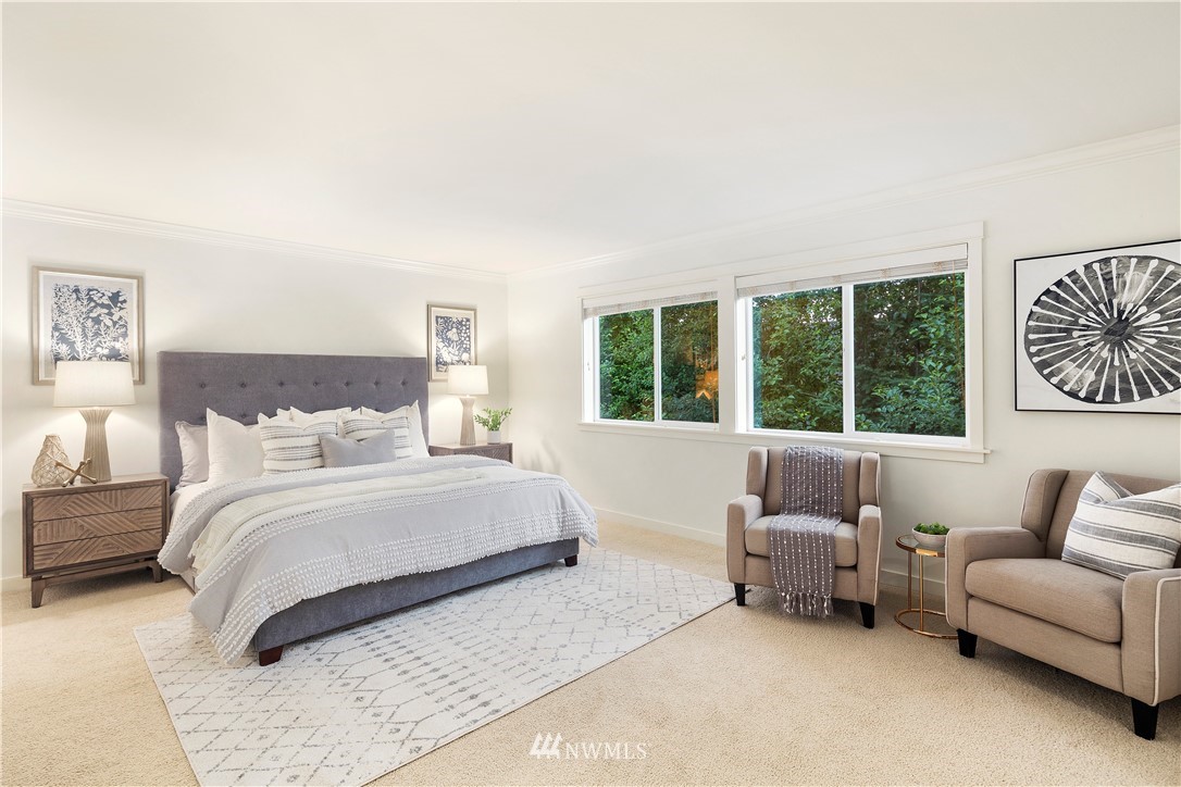 3714 215th Place Southeast Bothell, WA 98021 - Photo 21 of 37 a bedroom with a bed and a couch with outer view