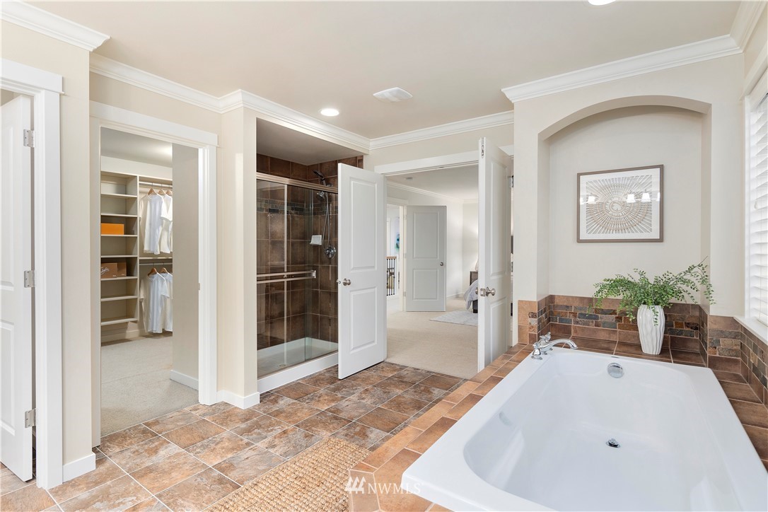 3714 215th Place Southeast Bothell, WA 98021 - Photo 27 of 37 a bathroom with bathtub and shower