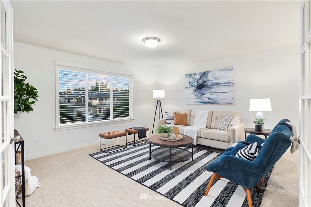 3714 215th Place Southeast Bothell, WA 98021 - Photo 28 of 37 a living room with furniture and a potted plant