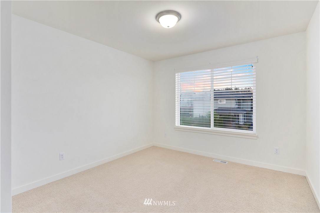 3714 215th Place Southeast Bothell, WA 98021 - Photo 30 of 37 an empty room with a window