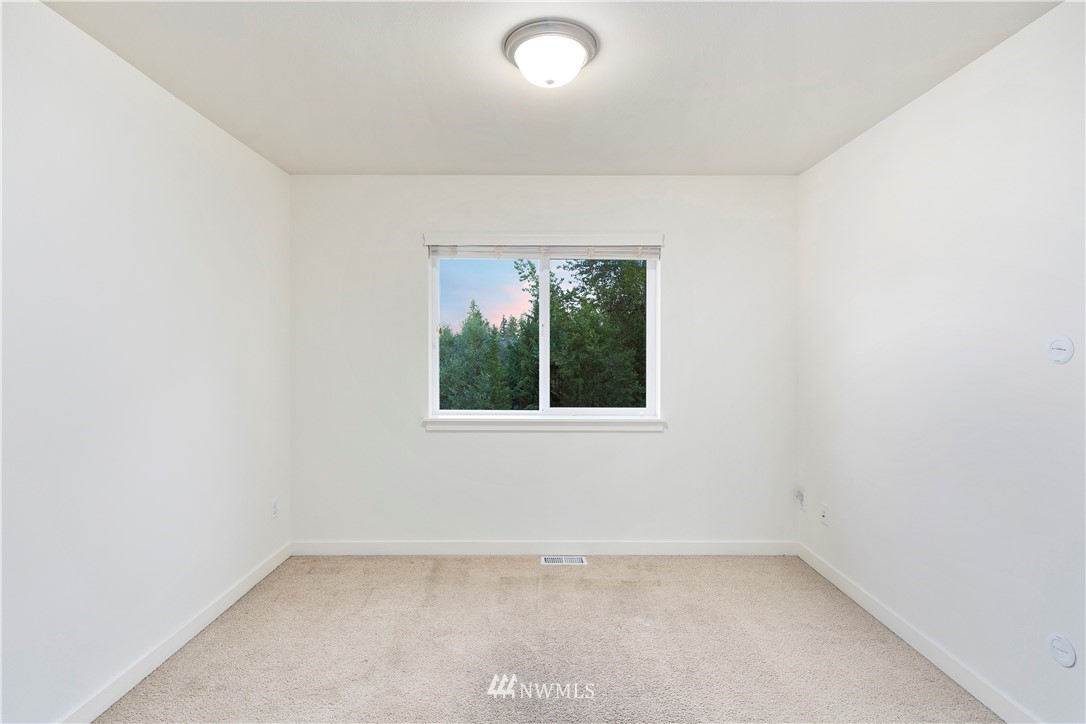3714 215th Place Southeast Bothell, WA 98021 - Photo 31 of 37 an empty room with a window