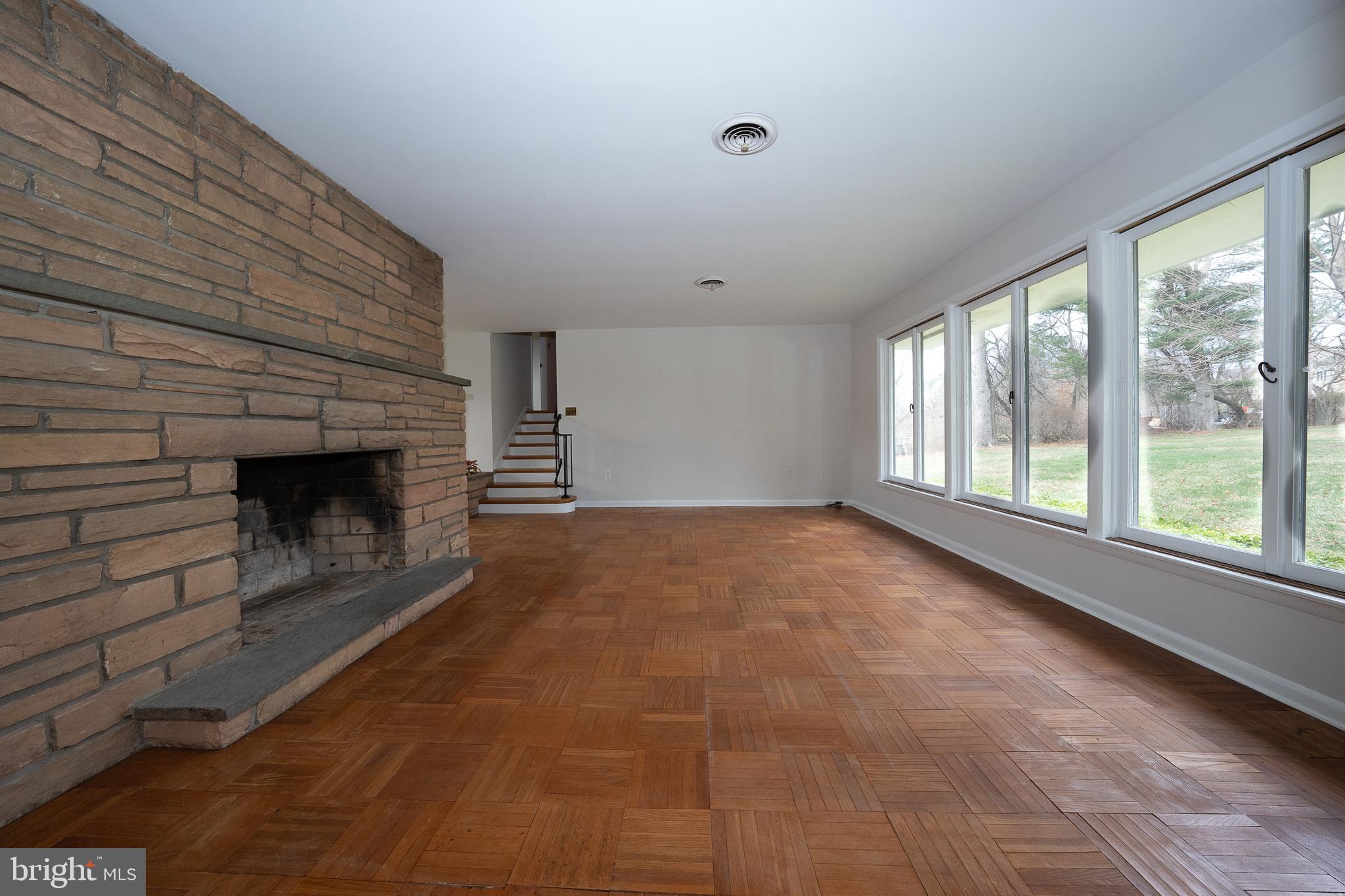 1435 North Trooper Road Methacton, PA 19403 - Photo 12 of 30 a view of an empty room with a fireplace and a window