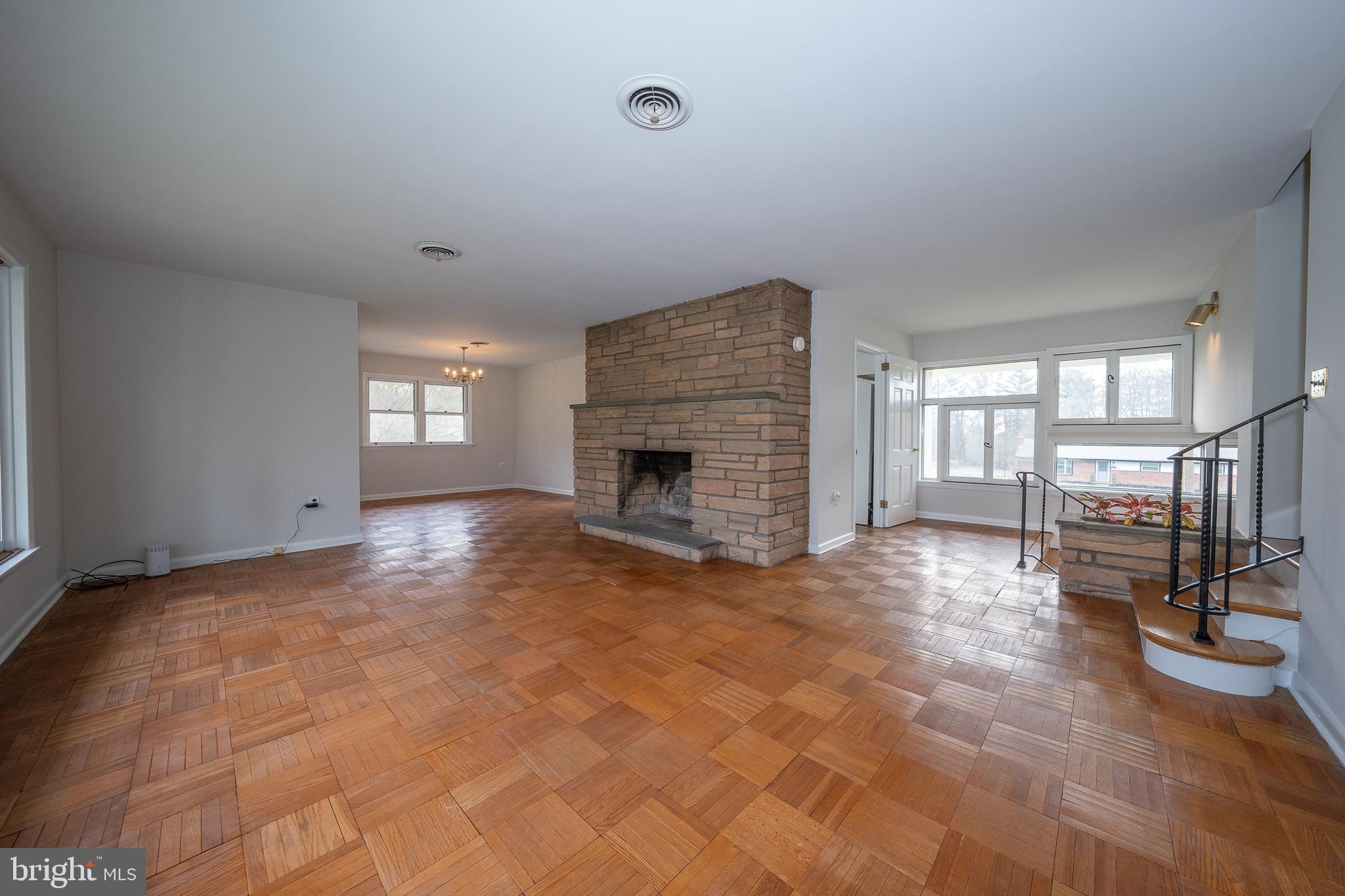 1435 North Trooper Road Methacton, PA 19403 - Photo 22 of 30 a view of empty room with fireplace and windows
