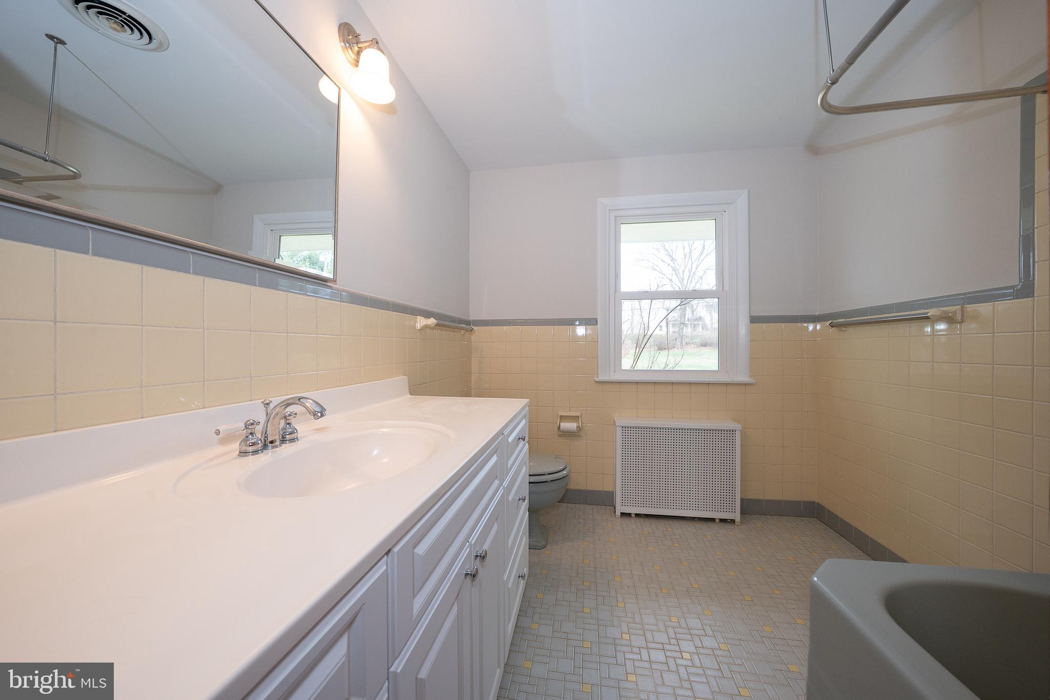 1435 North Trooper Road Methacton, PA 19403 - Photo 26 of 30 a bathroom with a sink a vanity and bathtub