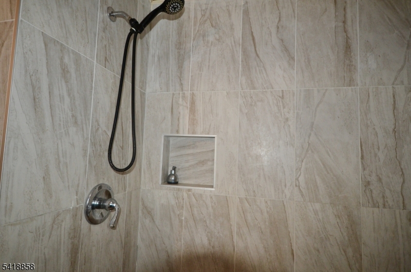 899 South 18th Street, Unit 1 Newark, NJ 07108 - Photo 14 of 23 a bathroom with a shower