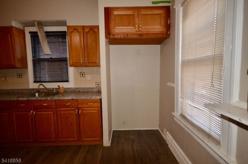 899 South 18th Street, Unit 1 Newark, NJ 07108 - Photo 18 of 23 a bathroom with a sink and a mirror