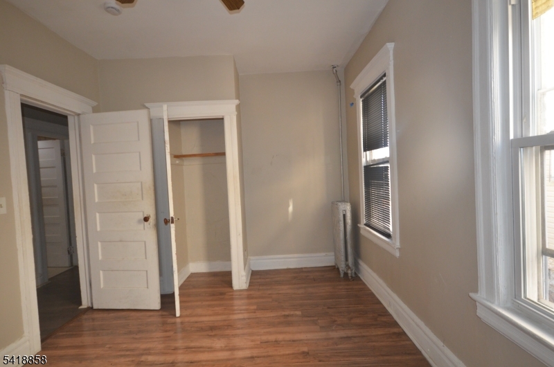 899 South 18th Street, Unit 1 Newark, NJ 07108 - Photo 9 of 23 a view of entryway with wooden floor