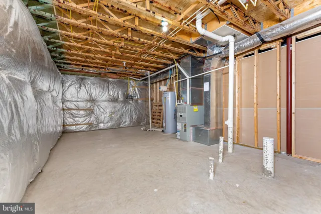 a view of a room with wooden walls