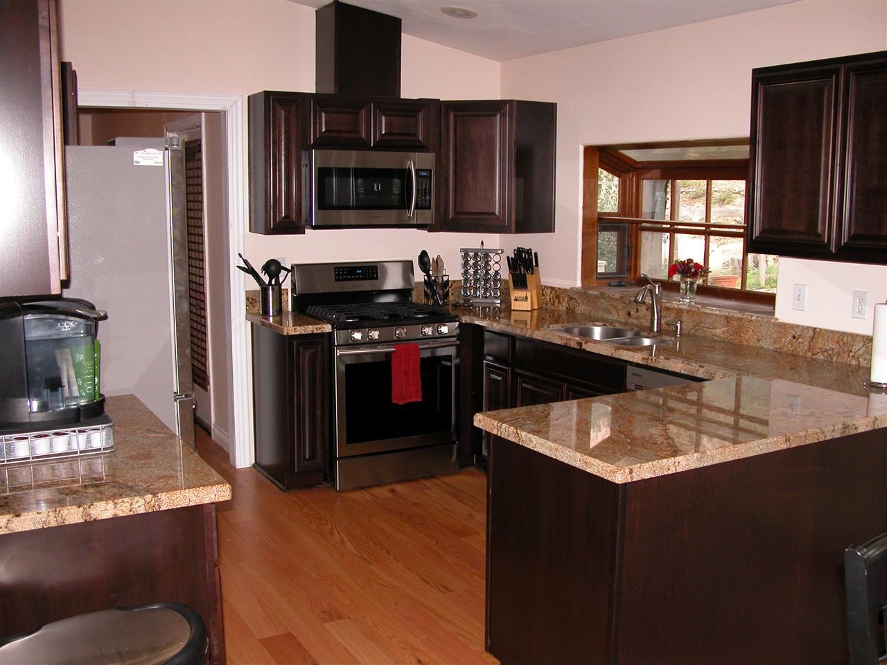 29813 Anthony Road Valley Center, CA 92082 - Photo 2 of 23 Newly installed kitchen cabinets, flooring, granite and appliances.