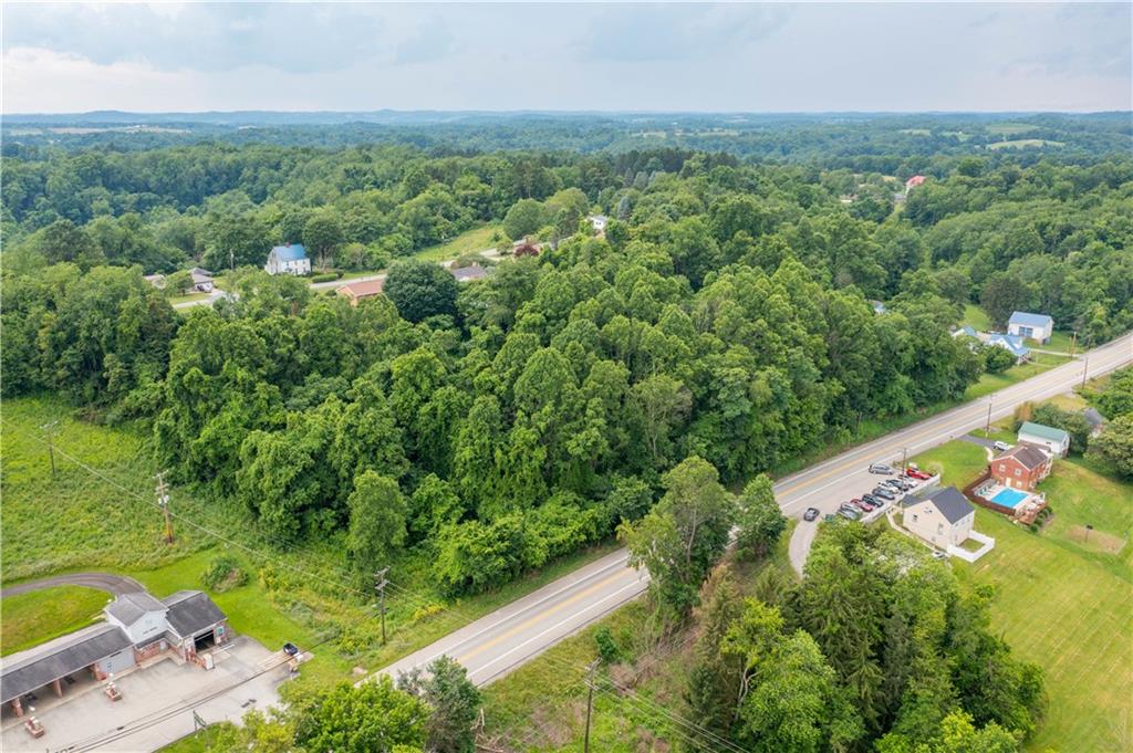 0 Route 40 Fredericktown, PA 15333 - Photo 12 of 16 an aerial view of residential houses with outdoor space and trees