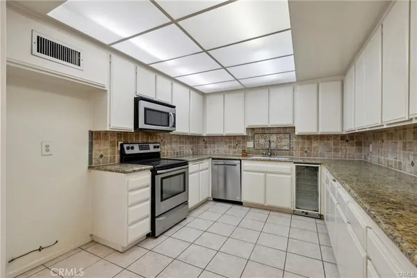 a bathroom with a bathtub and a sink