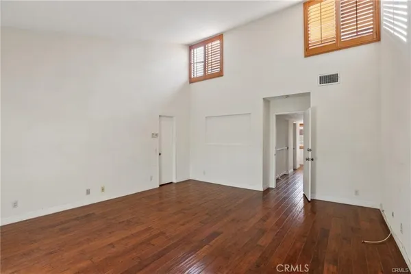 a white house with a yard