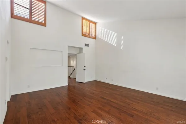 a view of kitchen with granite countertop cabinets and outdoor space