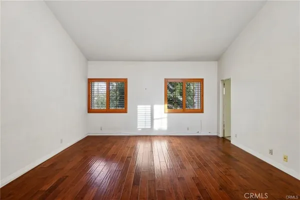 a kitchen with stainless steel appliances granite countertop a stove and a microwave