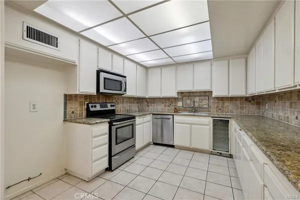 a bathroom with a sink and a window