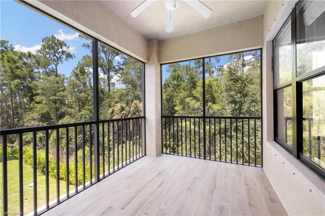 a view of storage and utility room with washer and dryer