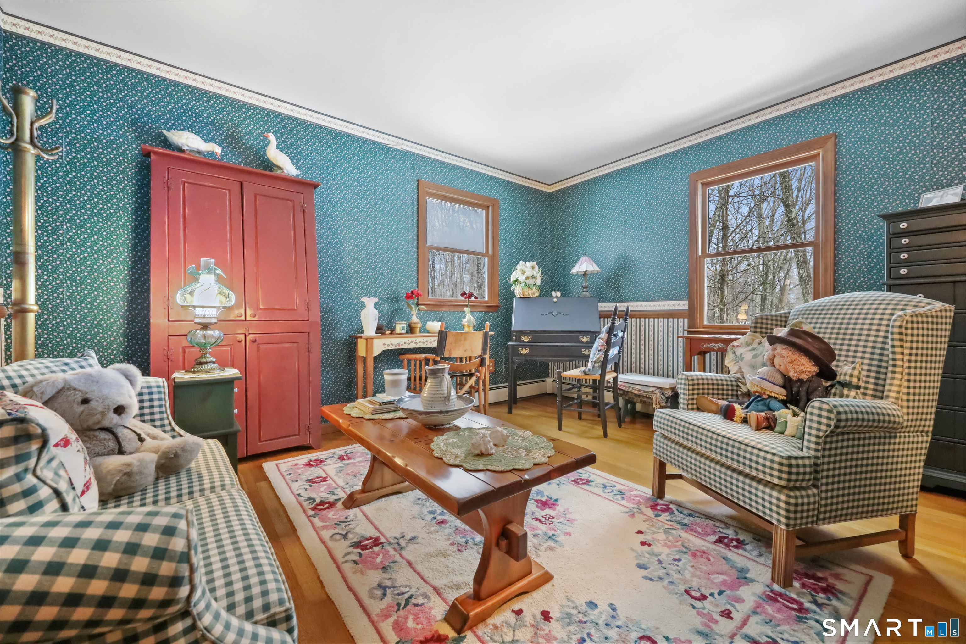 429 Rock House Road Redding, CT 06896 - Photo 25 of 26 a living room with furniture and a window