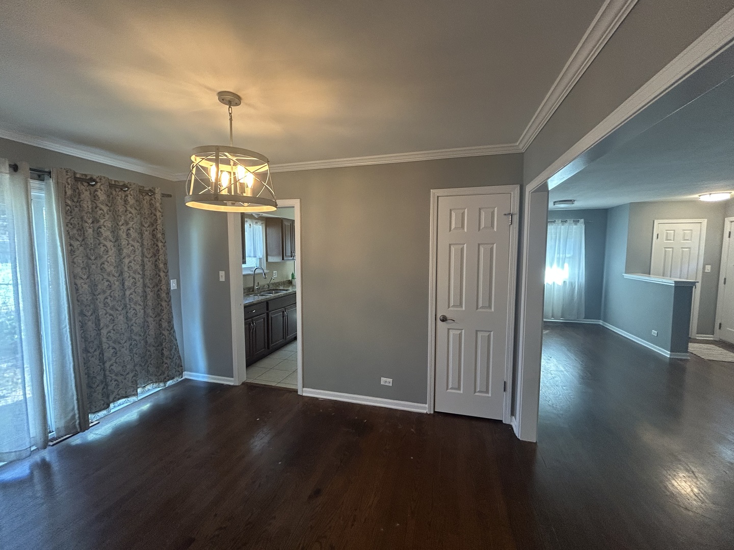 1317 North Mitchell Avenue Arlington Heights, IL 60004 - Photo 5 of 16 wooden floor in an empty room with a window