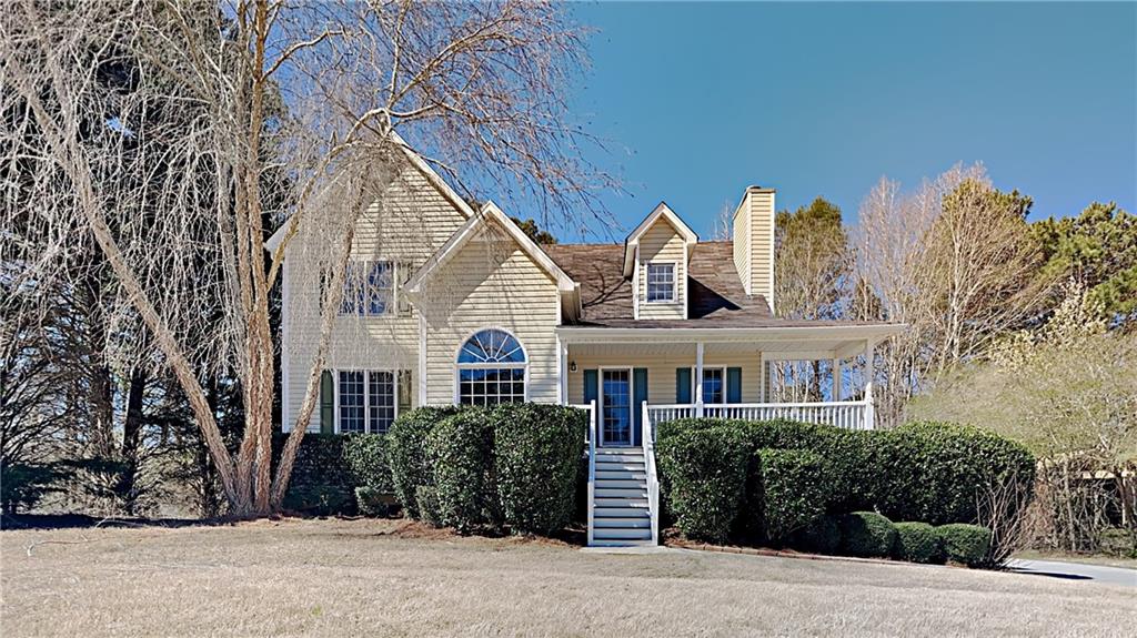 42 Appleton Way Dallas, GA 30157 - Photo 1 of 1 a front view of a house with a garden