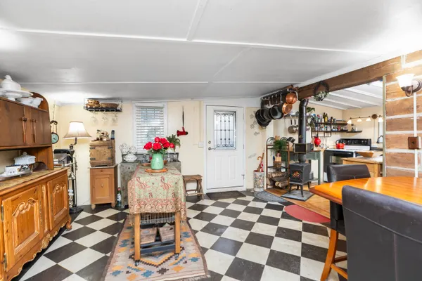 a kitchen with stainless steel appliances granite countertop a stove and cabinets